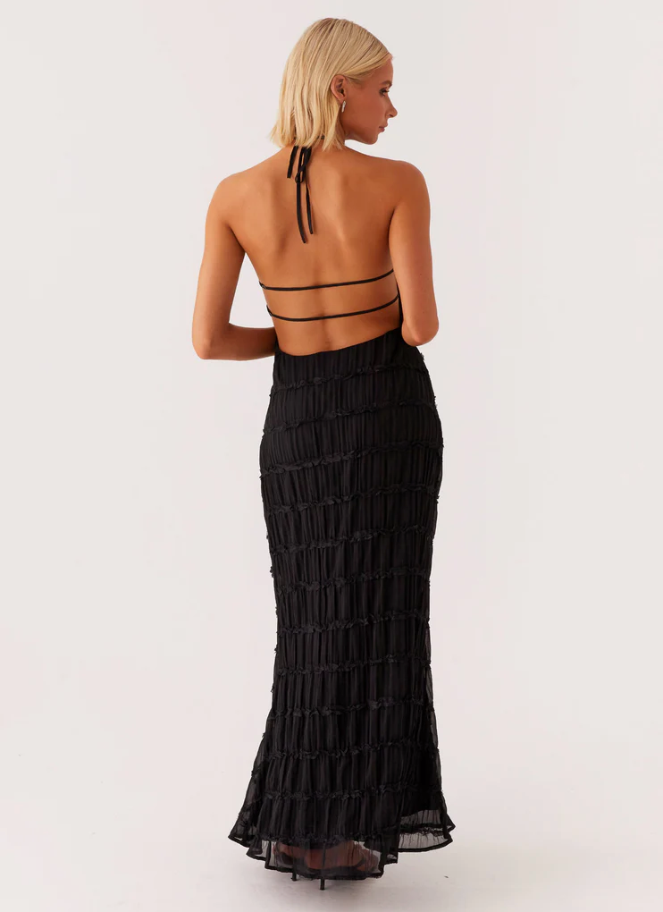 Special occasion women's halter maxi dress, elegant and formal for wedding guests.