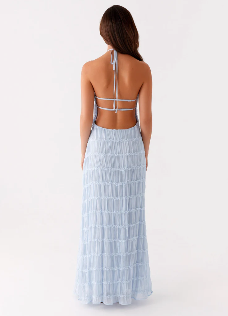 Formal halter maxi dress, sophisticated and elegant choice for women as wedding guests.