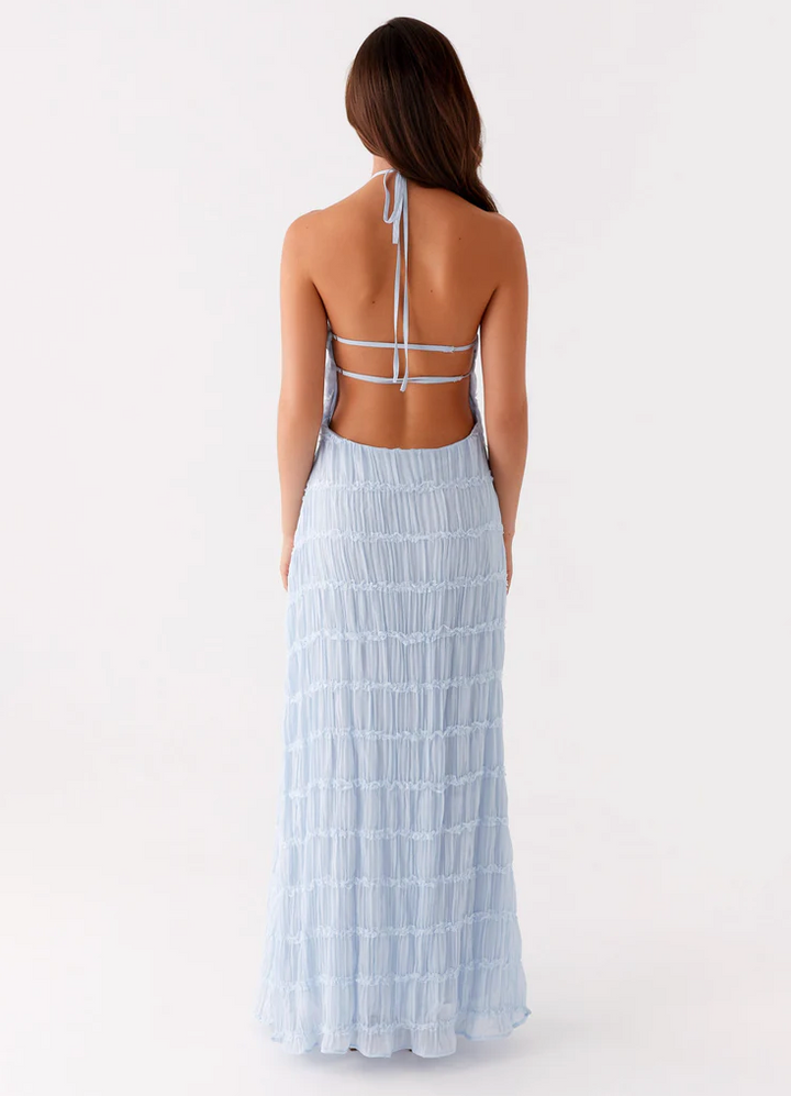 Formal halter maxi dress, sophisticated and elegant choice for women as wedding guests.