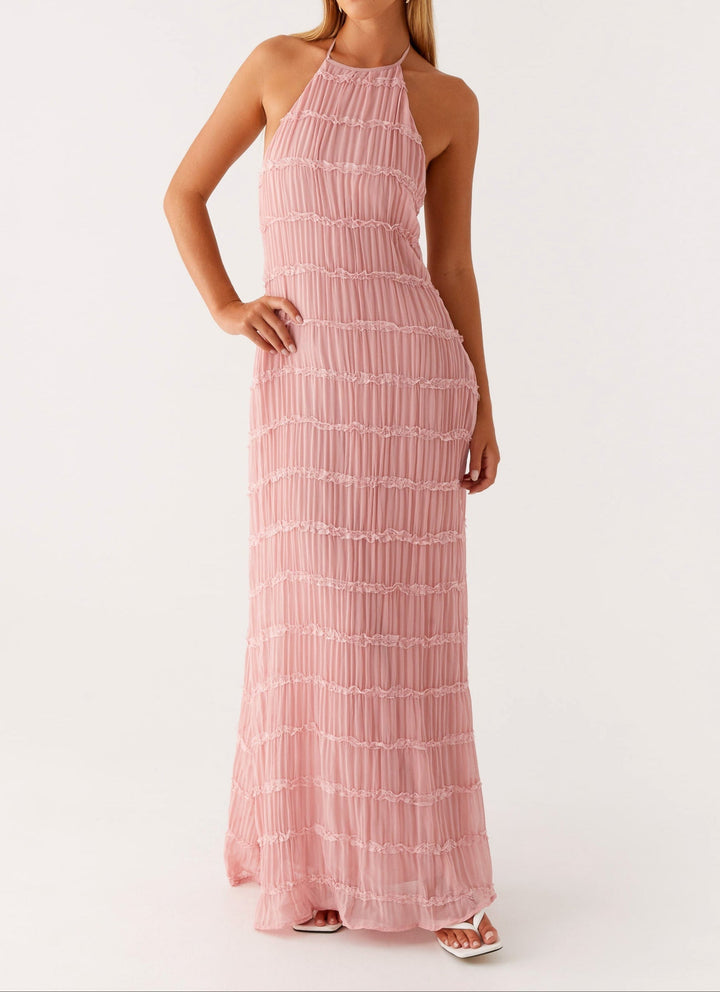 Elegant women's halter maxi dress with open back, ideal wedding guest attire.