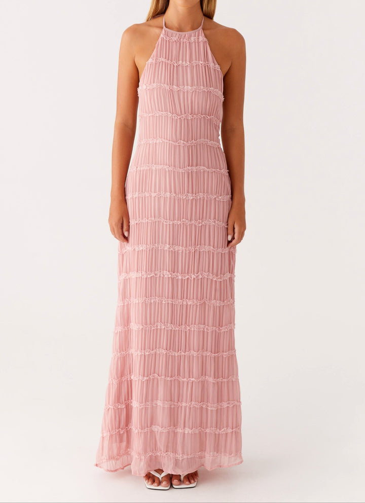 Contemporary halter neck maxi dress, stylish and comfortable wedding guest fashion.