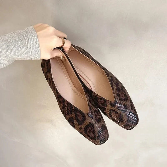 Chic leopard print women's slip-on flats, perfect for comfortable everyday fashion footwear.