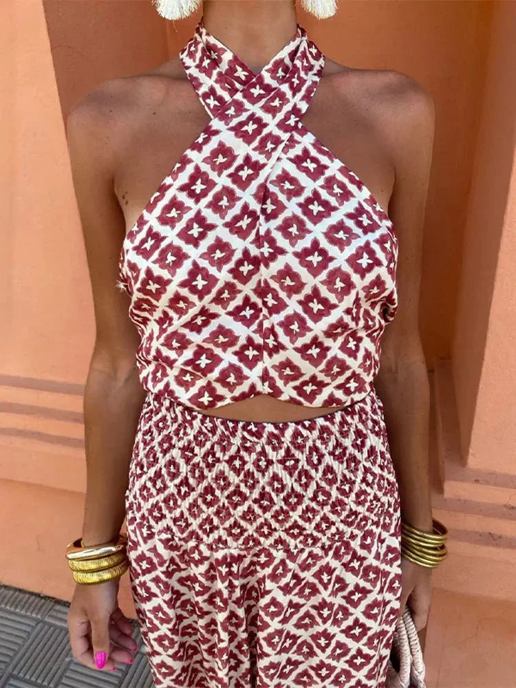 Women's elegant printed halter maxi dress, perfect as a chic wedding guest or formal party dress.