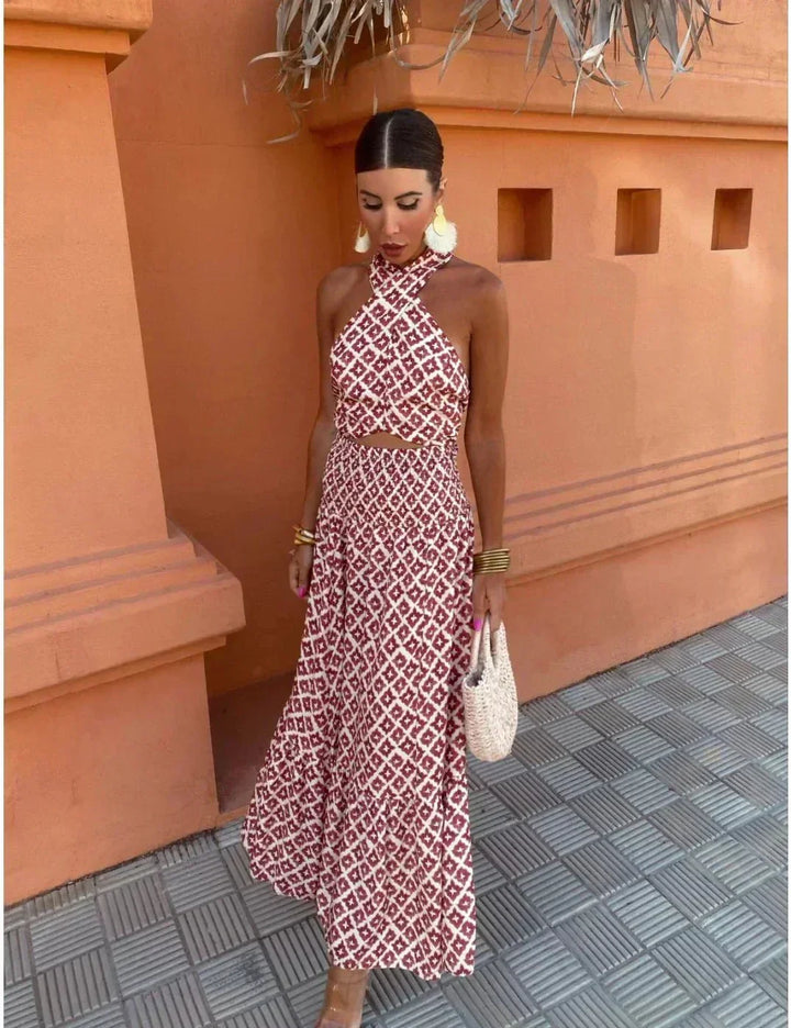 Chic women's printed halter maxi wedding guest dress with elegant flowing style. Perfect for special events.