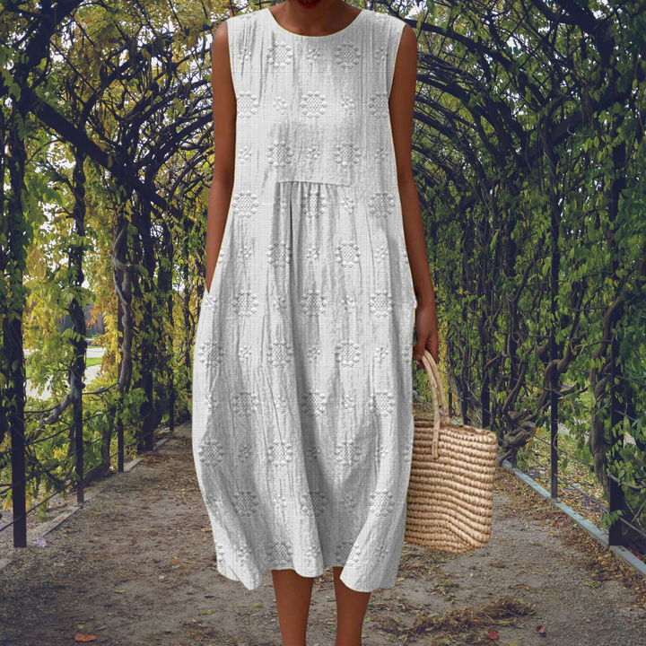 Colorful sleeveless flowy women's casual dress, great for effortless everyday summer style.