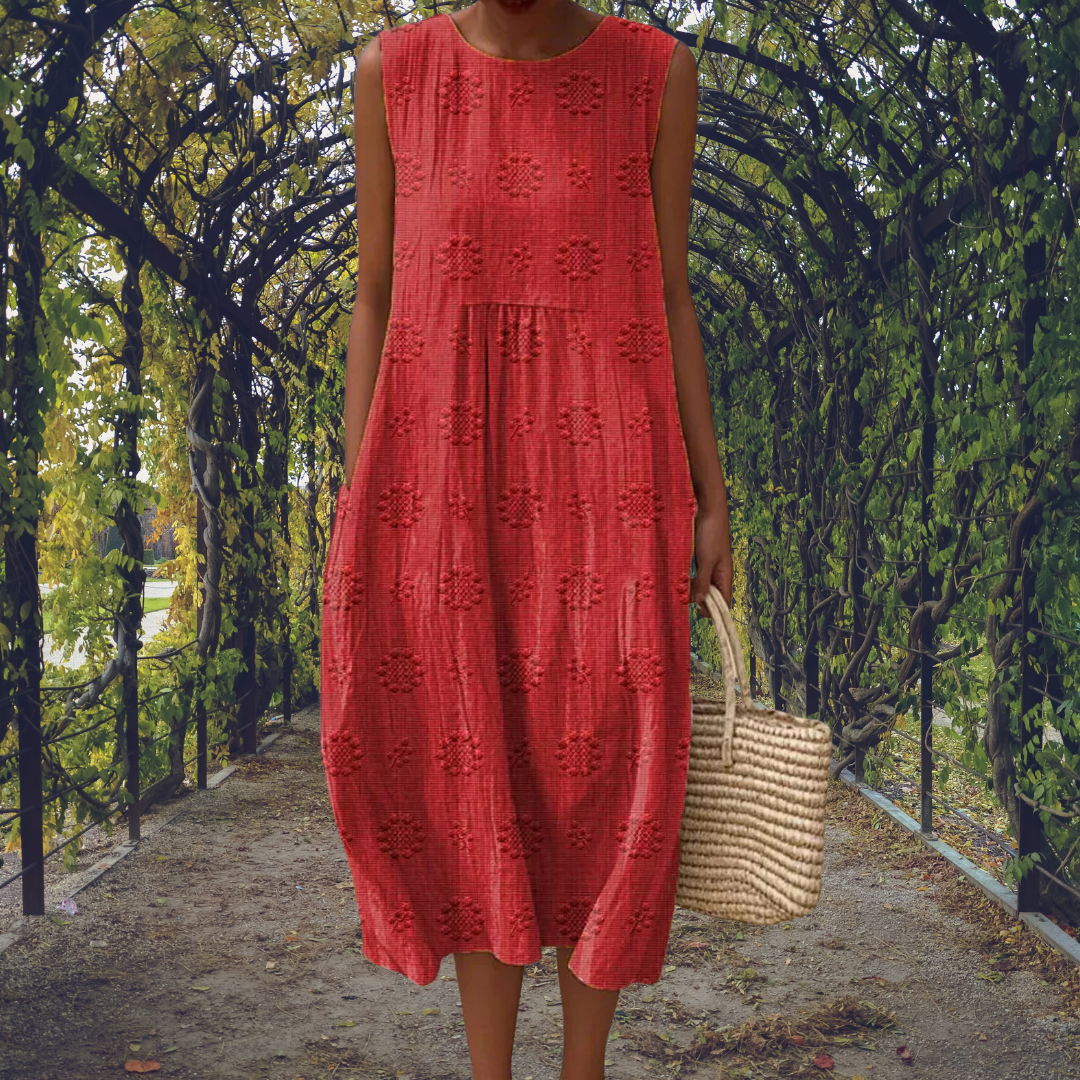 Women's chic sleeveless flowy midi dress, an elegant choice for summer vacations and beach trips.