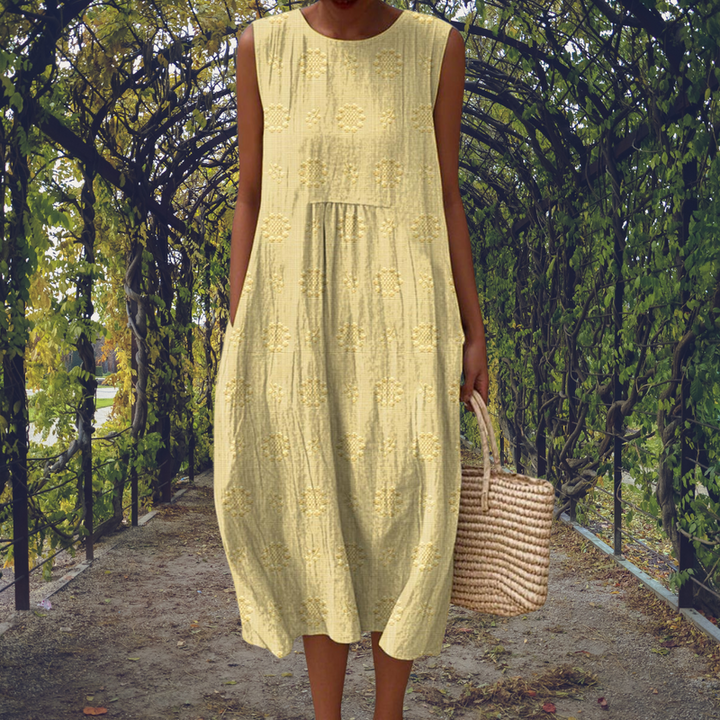 Versatile women's sleeveless flowy midi dress, a chic and airy option for summer casual to elegant wear.