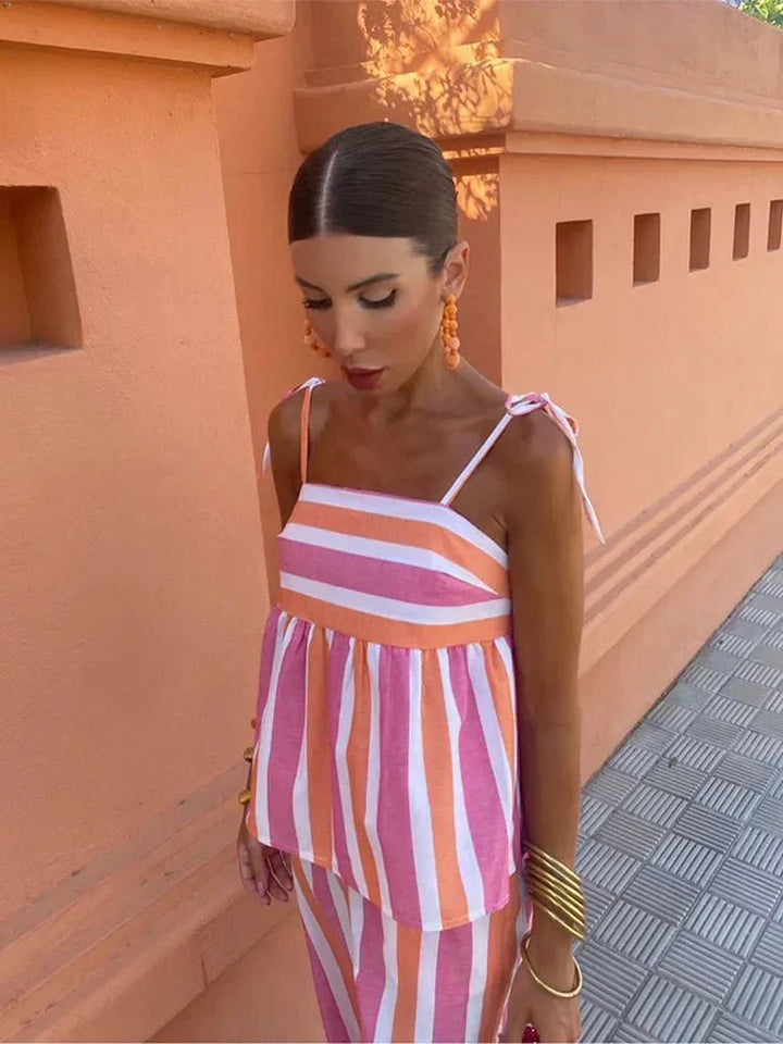 Summer wedding guest striped wide leg dress set for women. Lightweight peplum top & pants, perfect for vacation.