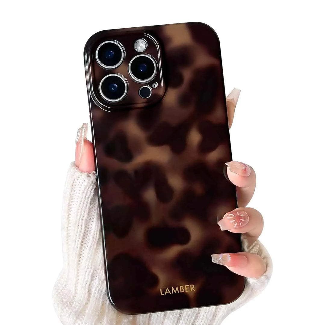 Luxury tortoiseshell pattern glass iPhone case, a fashionable accessory providing durable phone protection.