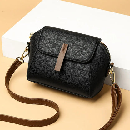 Women's fashion vegan leather crossbody bag, water-resistant & secure.