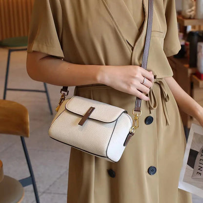 Modern vegan leather crossbody bag, a stylish and secure women's accessory.