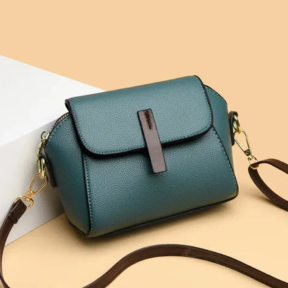 Durable women's vegan leather small crossbody purse, adjustable strap.