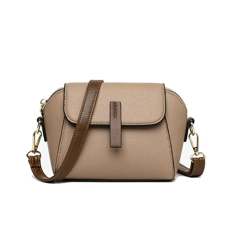 Secure & water-resistant women's vegan leather crossbody purse, adjustable strap.
