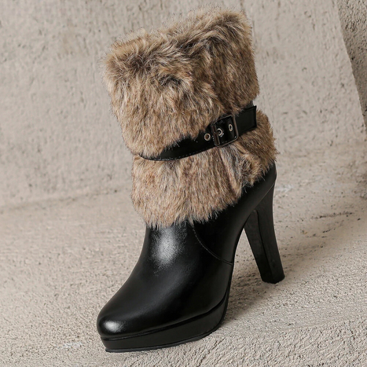 Chic women's black heeled ankle boots with elegant buckle detail, perfect for versatile fashion.