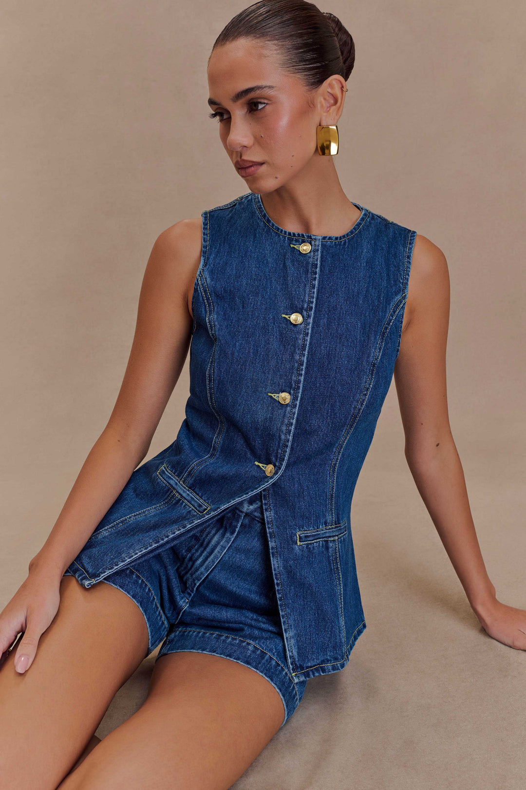 Stylish women's blue denim matching two-piece set. Comfortable and chic denim outfit for trendy casual wear.