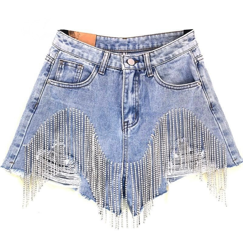 Chic women's blue tassel shorts, perfect for stylish summer casual wear. Comfortable fashion shorts for warm weather.