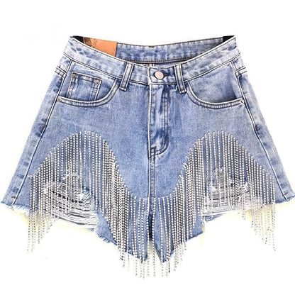 Chic women's blue tassel shorts, perfect for stylish summer casual wear. Comfortable fashion shorts for warm weather.