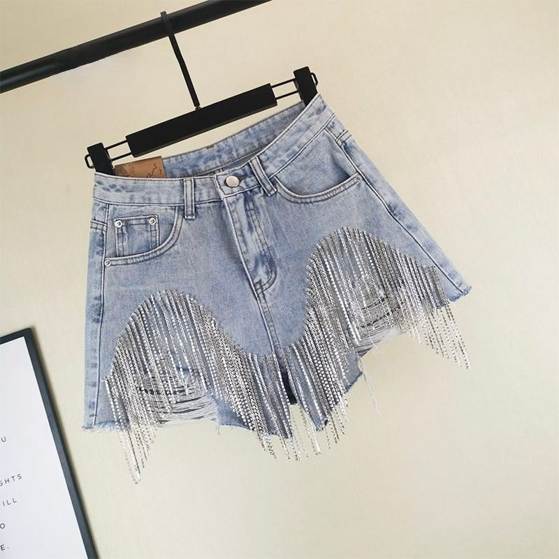 Comfy women's blue tassel shorts, ideal for warm weather and casual summer outfits. Stylish and chic bottomwear.