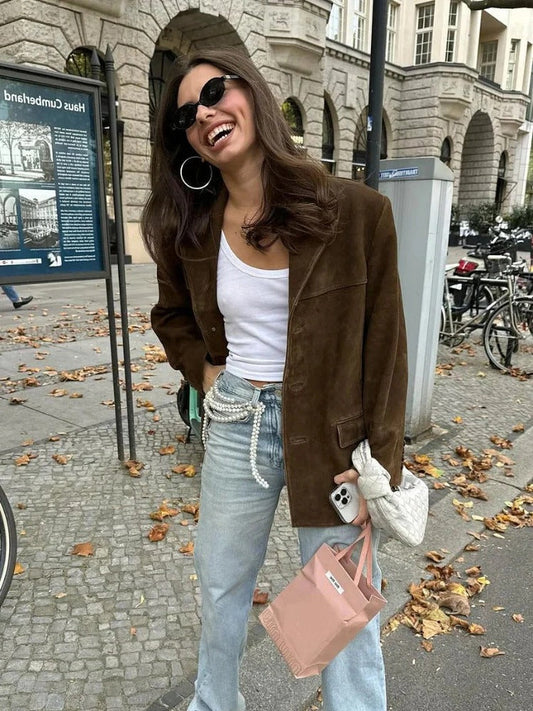 Chic women's brown suede long sleeve fall jacket. Elegant outerwear for office attire or casual autumn style.