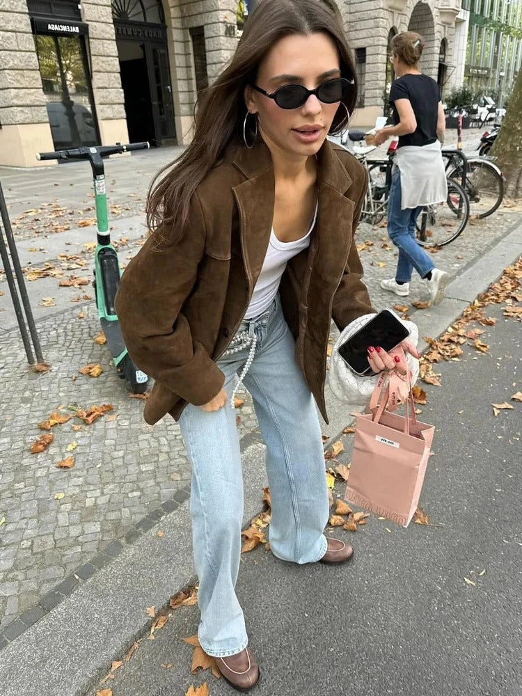 Elegant brown suede long sleeve women's jacket. Perfect fall outerwear for chic office or autumn fashion.