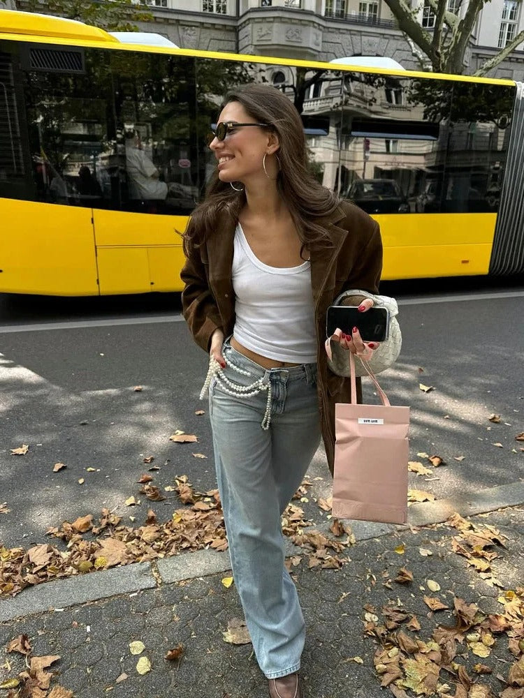 Stylish women's brown long sleeve suede fall jacket. Ideal for elegant office wear or casual autumn fashion.