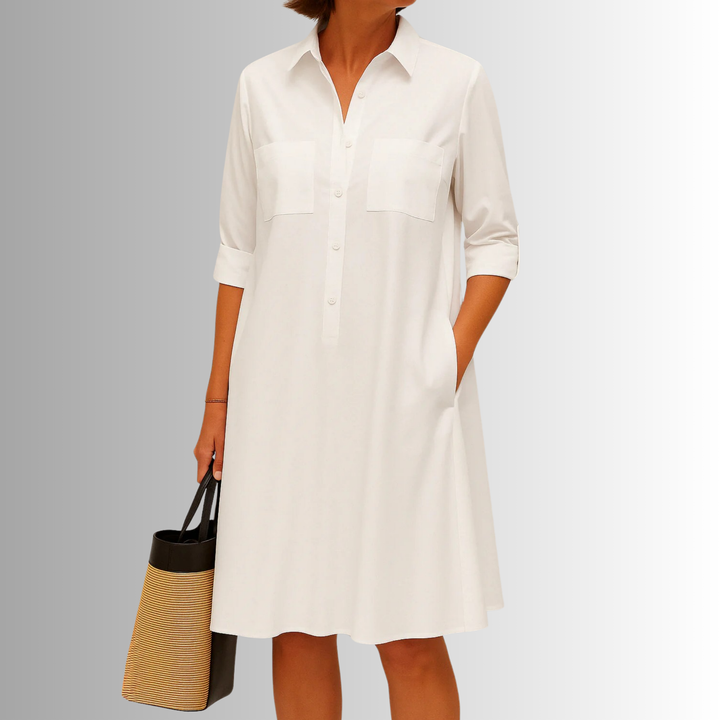 Elegant green button-front A-line dress for women. A versatile summer dress with a classic collar and pockets.