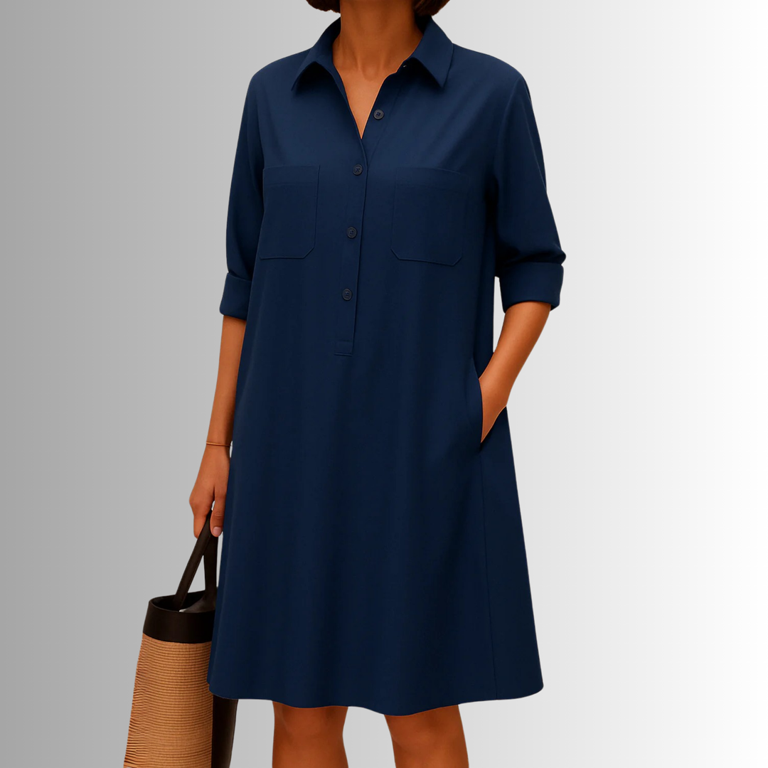 Casual white button-front A-line dress, ideal for summer. This women's collared dress offers comfort & style.