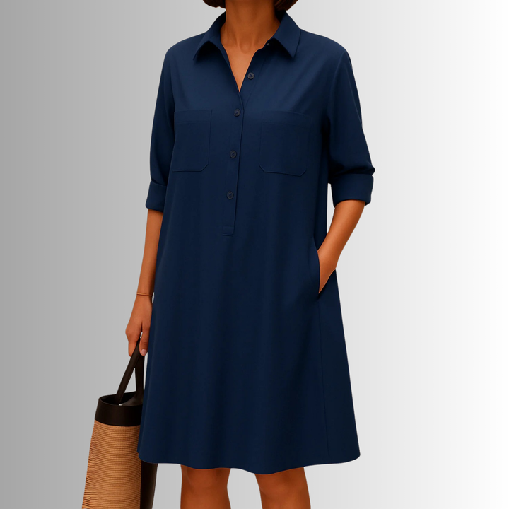 Casual white button-front A-line dress, ideal for summer. This women's collared dress offers comfort & style.