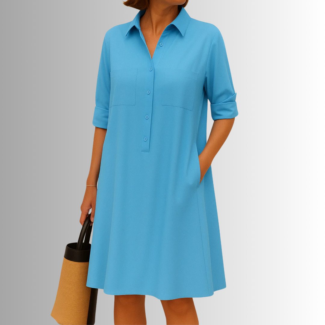 Versatile women's A-line dress in a vibrant pink. This button-front collared dress transitions from casual to elegant.