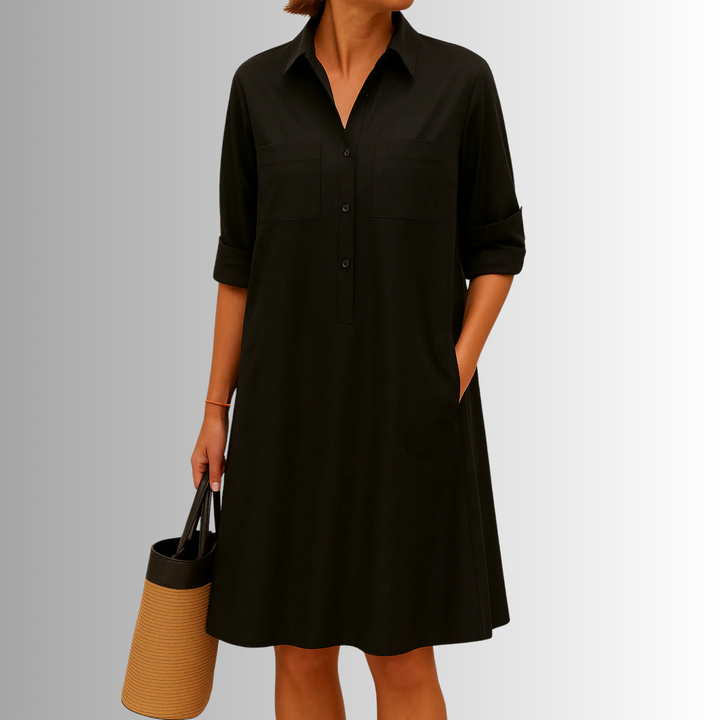 Stylish blue button-front A-line dress. A chic women's summer dress with a collared neckline and comfortable design.