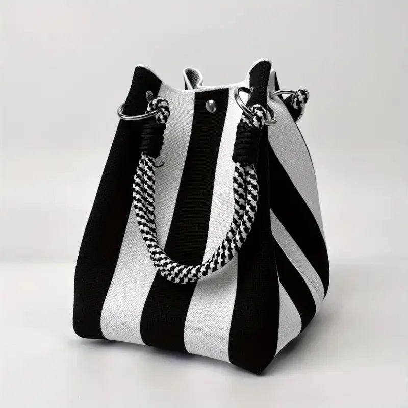 Modern women's mini canvas bucket bag, a chic patchwork shoulder or crossbody bag. Perfect for everyday style.