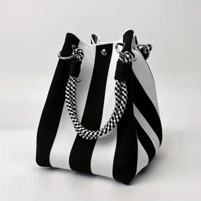 Modern women's mini canvas bucket bag, a chic patchwork shoulder or crossbody bag. Perfect for everyday style.