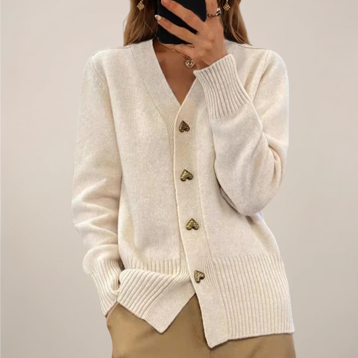 Women's chic cardigan, a relaxed fit long sleeve sweater adorned with elegant gold heart button accents for versatile wear.