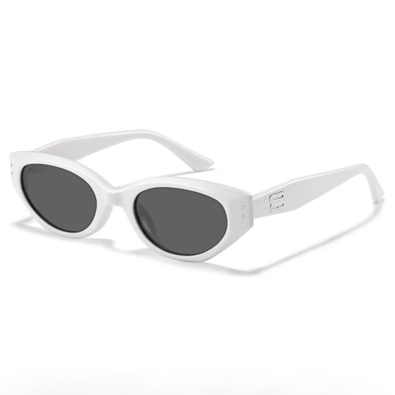 Modern women's eyewear: sleek cat-eye sunglasses with anti-glare lenses & UV protection for sunny days.