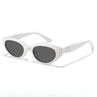 Modern women's eyewear: sleek cat-eye sunglasses with anti-glare lenses & UV protection for sunny days.