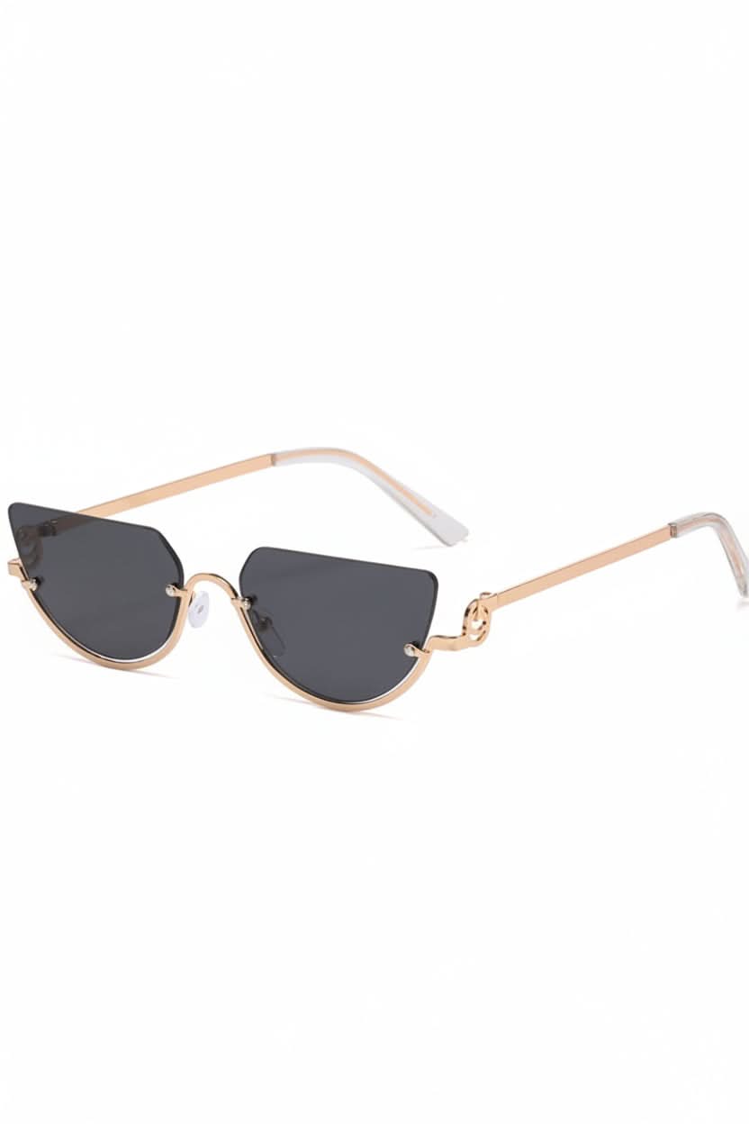 Elegant women's cat eye sunglasses with a chic metal frame. Offers full UV protection, a stylish eyewear accessory.
