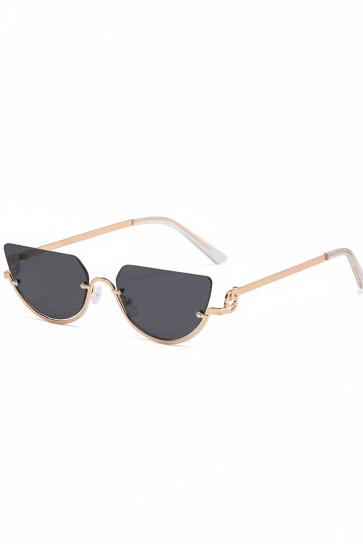 Elegant women's cat eye sunglasses with a chic metal frame. Offers full UV protection, a stylish eyewear accessory.