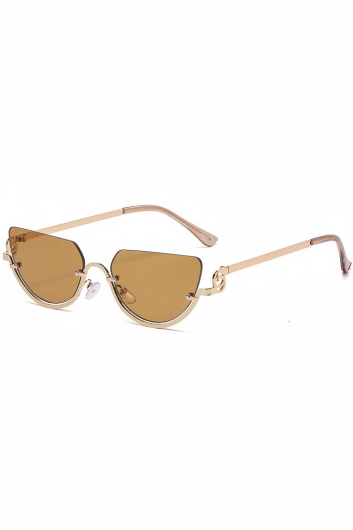 Women's chic cat eye sunglasses for UV protection. Lightweight and elegant metal frame eyewear, a fashion accessory.