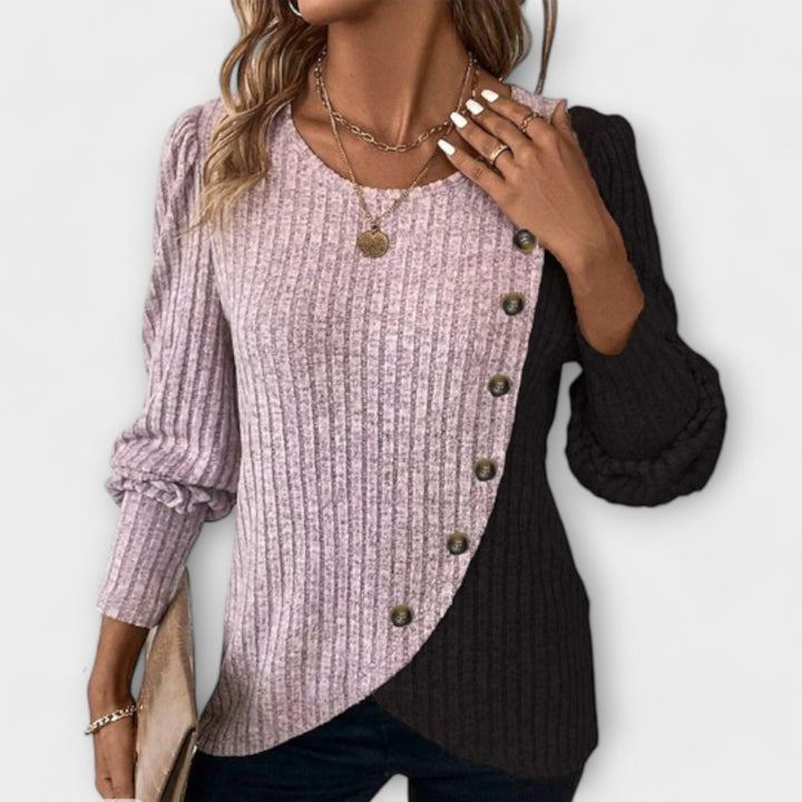 Stylish women's colorblock blouse featuring unique asymmetric design. Perfect long sleeve top for everyday chic fashion.