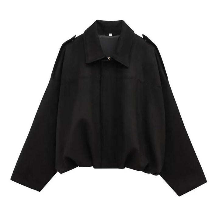 Stylish brown cropped jacket for women, featuring a modern structured design. Ideal casual outerwear for everyday.