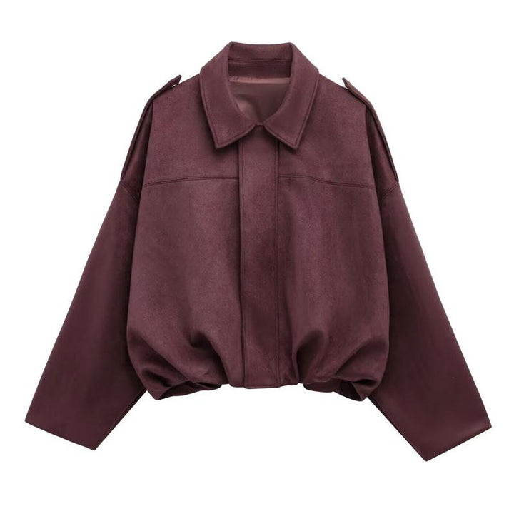 Versatile black cropped jacket, offering a chic look for women. Effortless style for spring and fall fashion.