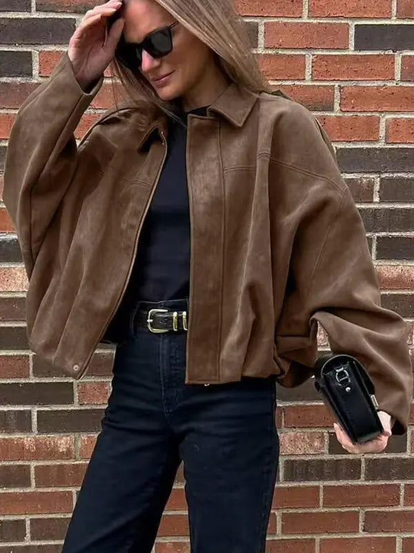Olive green cropped jacket, a chic and casual outerwear option for women. Perfect for modern everyday style.
