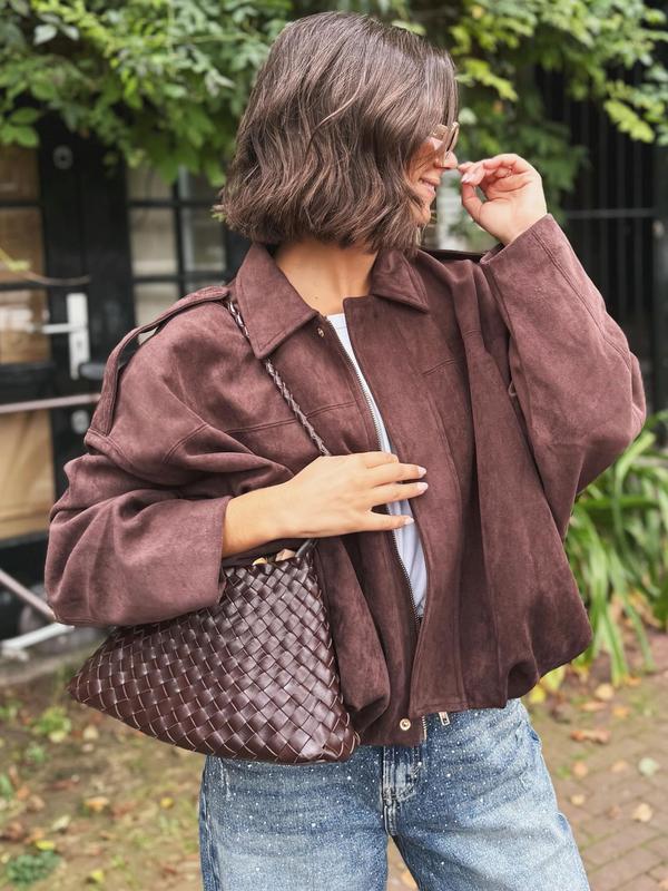Women's chic cropped jacket with modern appeal, perfect versatile outerwear for stylish layering.