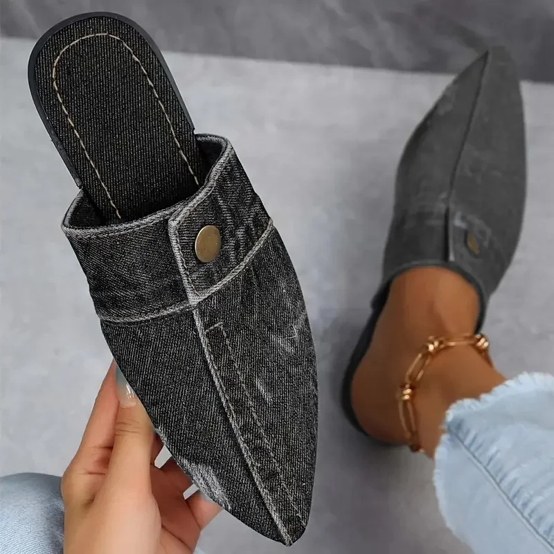 Pointed-toe women's denim mule slides, an effortless and stylish slip-on shoe for everyday wear.