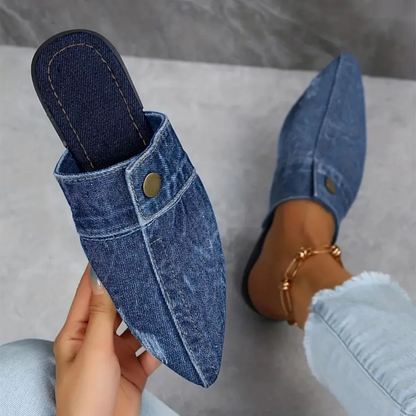 Women's denim slip-on mule slides, combining chic style with comfortable, easy-to-wear footwear.