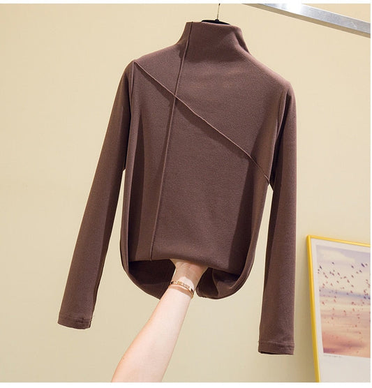 Chic women's essential high-neck turtleneck top, a versatile long sleeve sweater for fall & winter layering.