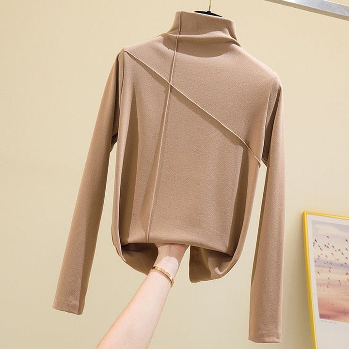 Warm women's high-neck turtleneck top, ideal long sleeve sweater for winter & fall fashion. Chic and cozy layering.