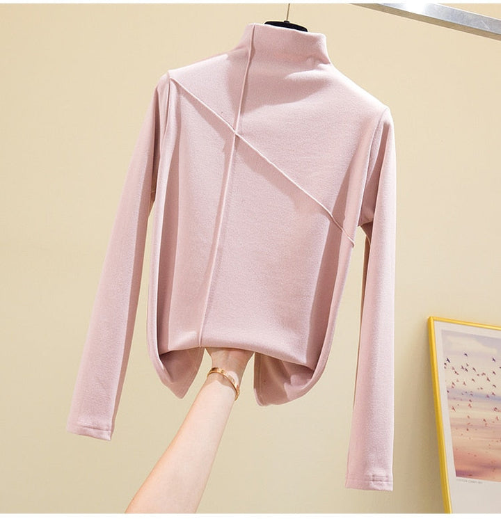 Elegant women's high-neck turtleneck top, a chic long sleeve sweater for fall & winter fashion. Versatile layering piece.