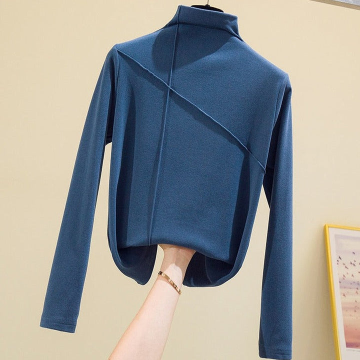 Women's essential high-neck long sleeve turtleneck top. Perfect casual sweater for fall, winter, and versatile layering.
