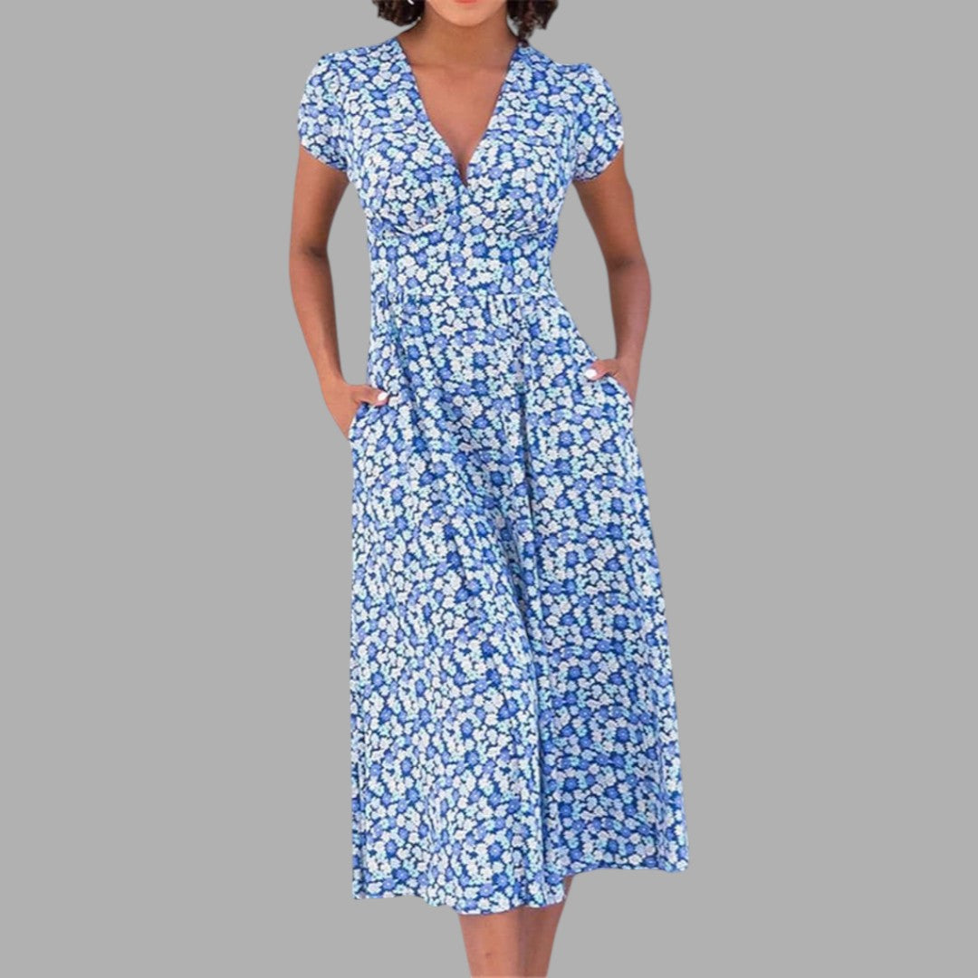 Chic women's floral midi dress with V-neck and short sleeves. Elegant and versatile for summer casual wear.